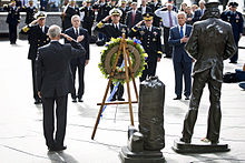 Defense Secretary Chuck Hagel and others lay a wreath at the Navy Memorial on September 17 in honor of the victims